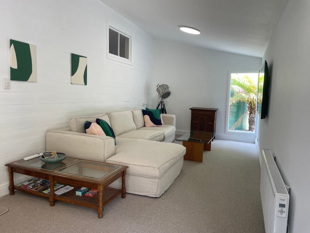 TV room with 65-inch Sony TV — The Cottage at Flowerpot, Southern Tasmania