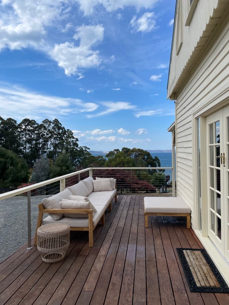 Second living area with white sofa — The Cottage at Flowerpot, Southern Tasmania