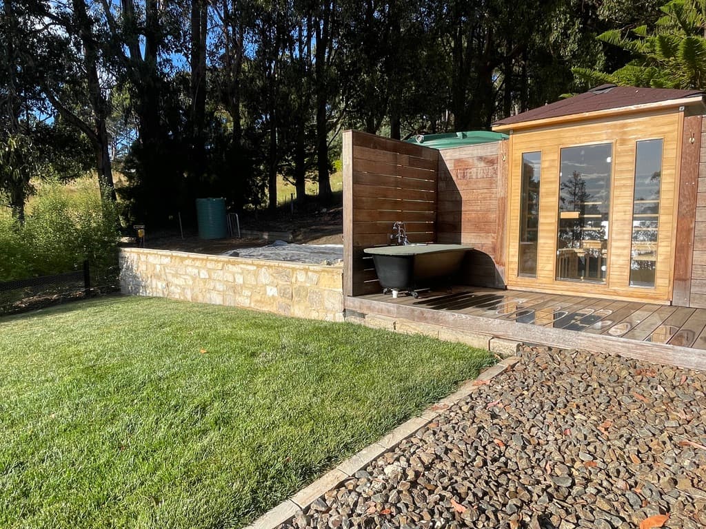Outdoor clawfoot bath and infrared sauna — The Cottage at Flowerpot, Southern Tasmania