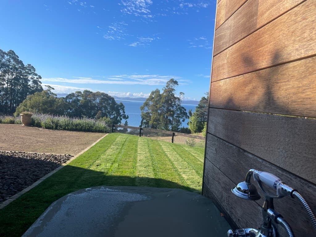 View from the outdoor clawfoot bath to Bruny Island — The Cottage at Flowerpot, Southern Tasmania