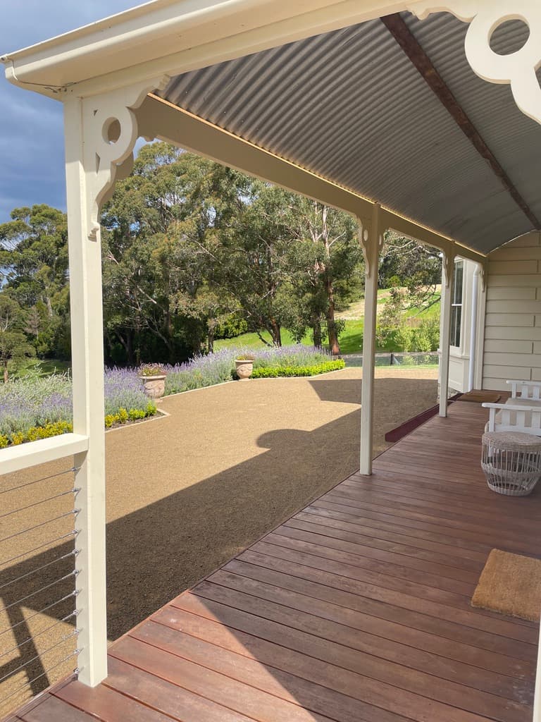 Covered timber verandah with views to the garden — The Cottage at Flowerpot, Southern Tasmania