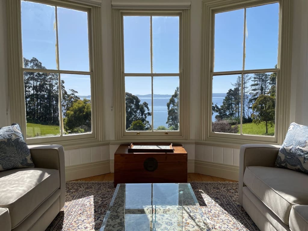 Heritage living room with modern comforts — The Cottage at Flowerpot, Southern Tasmania